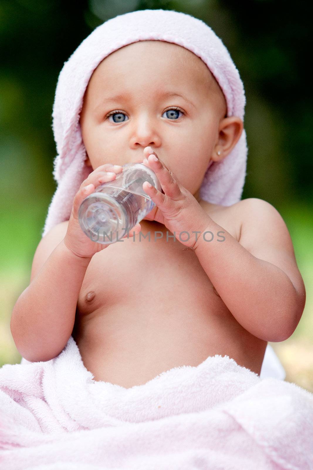 Baby and an oil bottle by DNFStyle