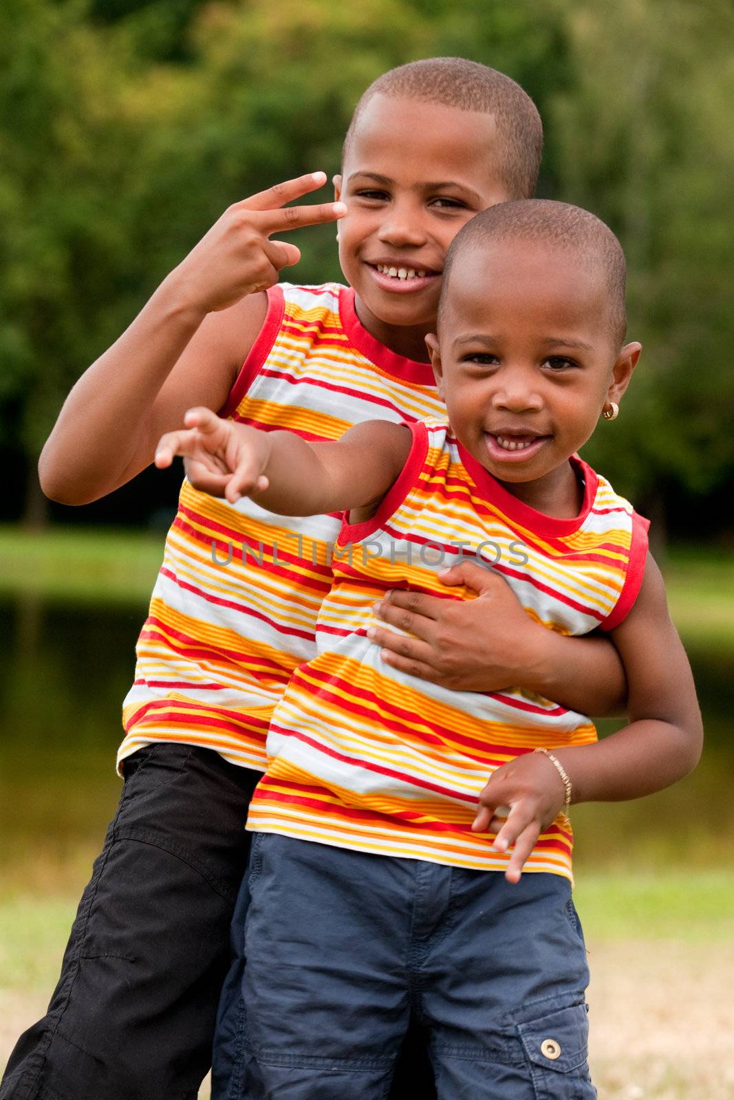 African children ginving peace sign by DNFStyle