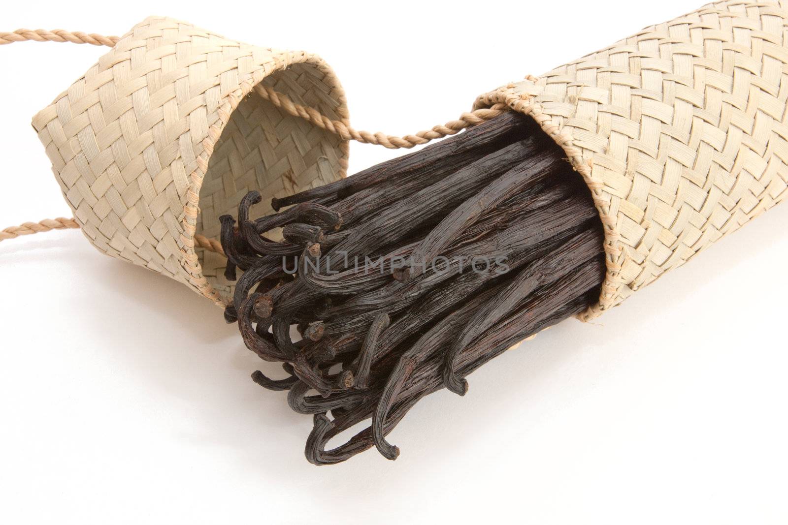 Boot of Bourbon vanilla beans in its case craft isolated on white background