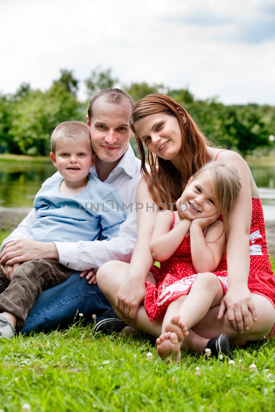 Happy family having a nice vacation in the park
