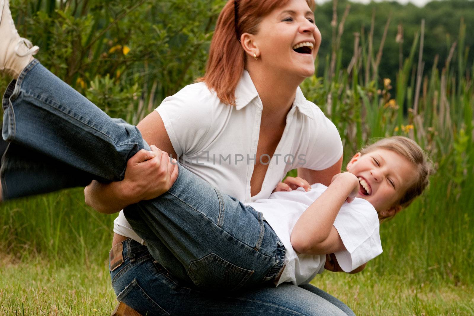 Mother and Daughter are happy in the park