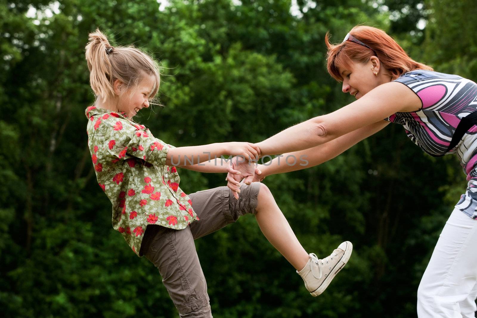 Mother and Daughter are happy in the park