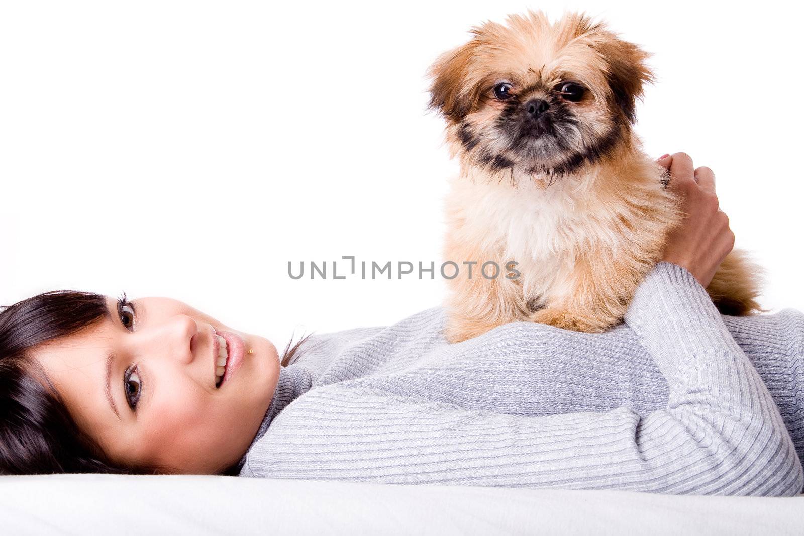 Brunette woman with a cute little pekingese