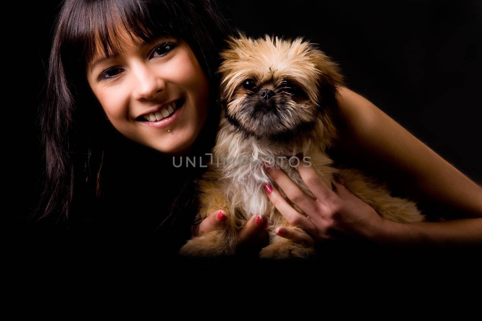 Brunette woman with a cute little pekingese