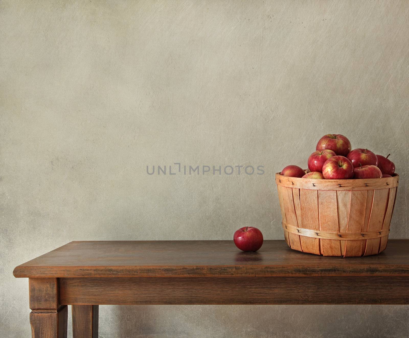 Fresh apples on wooden table by Sandralise
