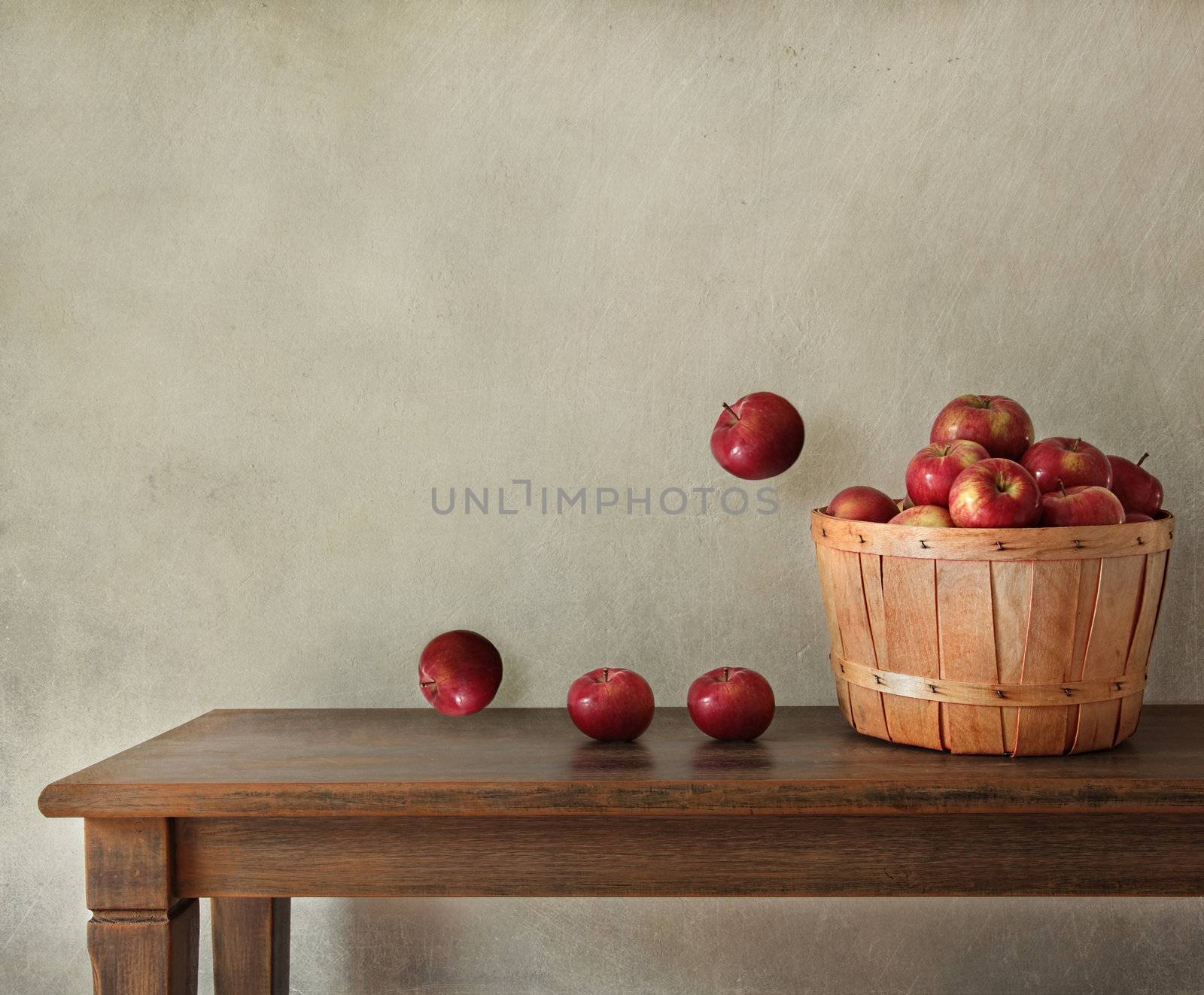 Fresh  apples on wooden table by Sandralise