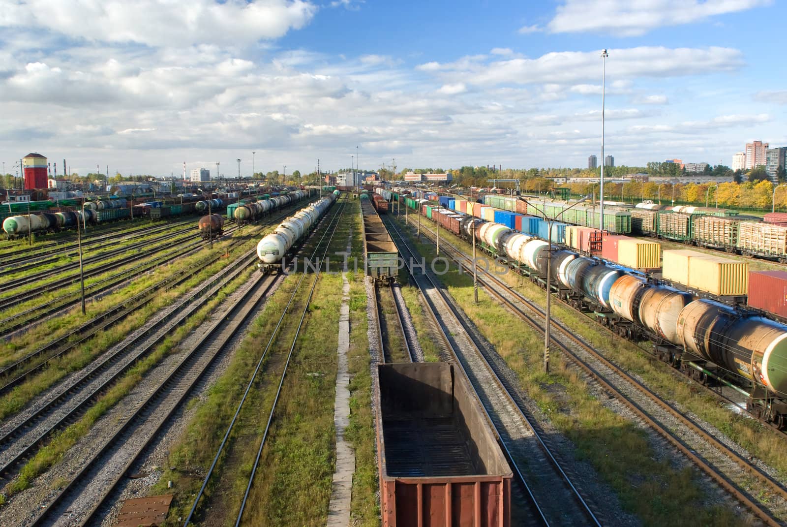 Sorting station with freight trains in summer sunny day by BIG_TAU