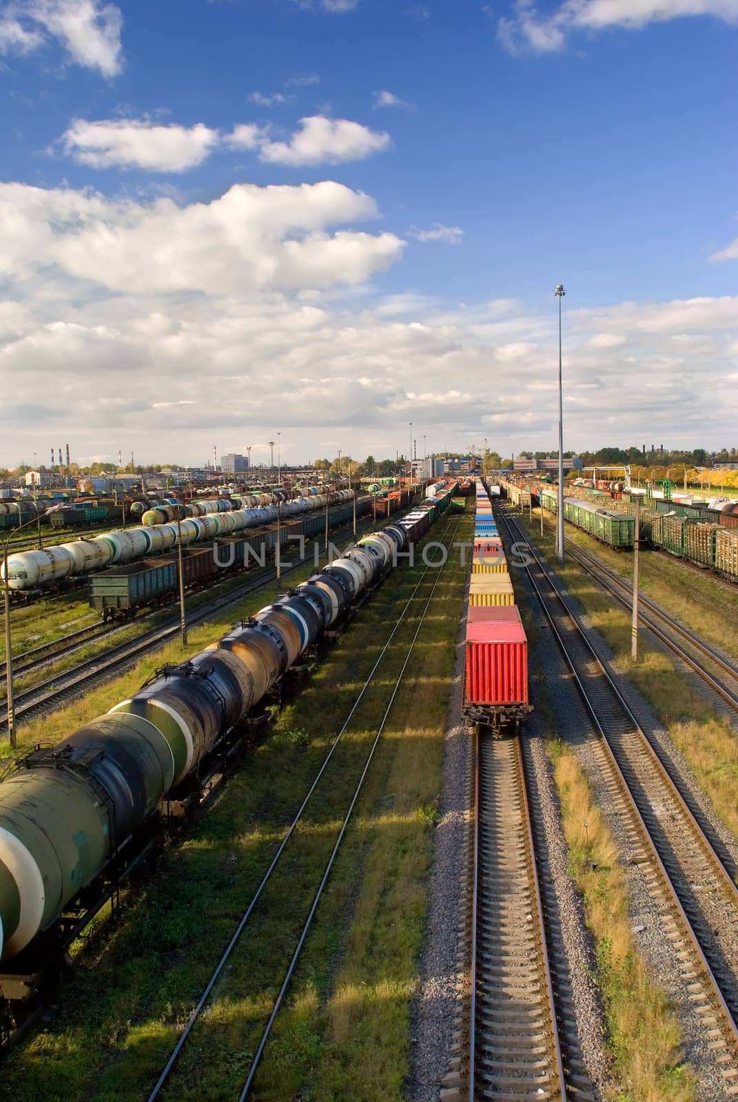 Sorting station with freight trains in sunny day