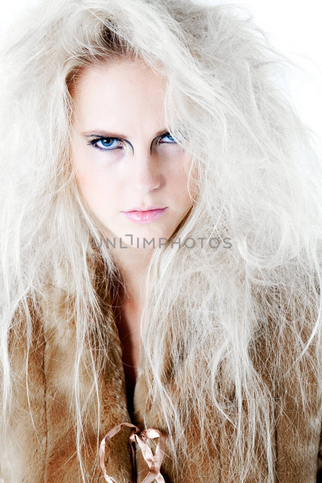 Model with wild white hair giving the viewer a fierce and agry look.
Usable for health and beauty, cosmetics, love, hate and emotional issues.