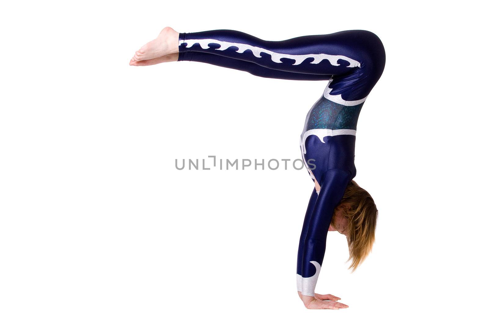 Young sportive girl with tricky gymnastic poses