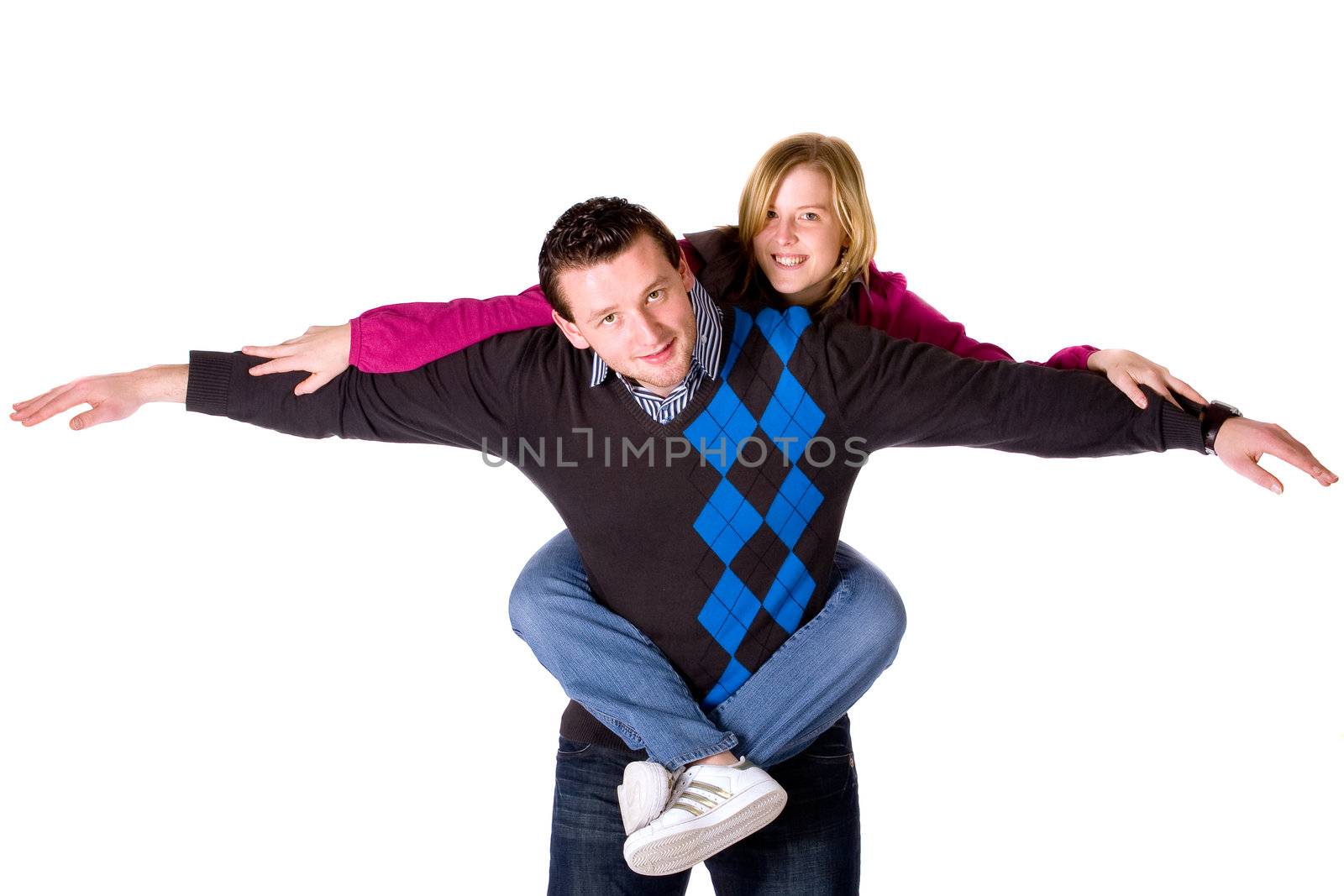 Young happy couple is having some fun together