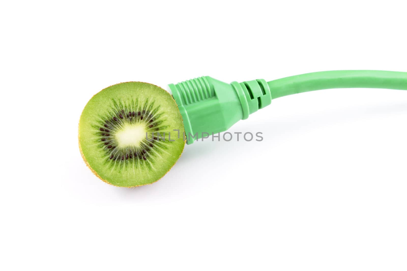 Electric plug is inserted into kiwi in metaphor of innovation working toward natural, green energy