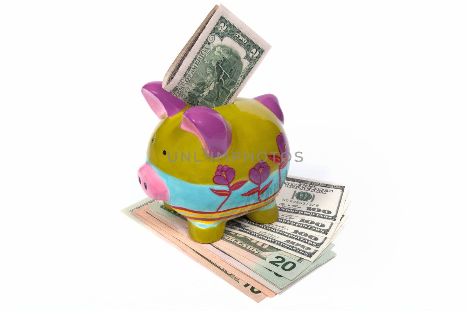 Colored piggy bank with lucky two dollars and money.