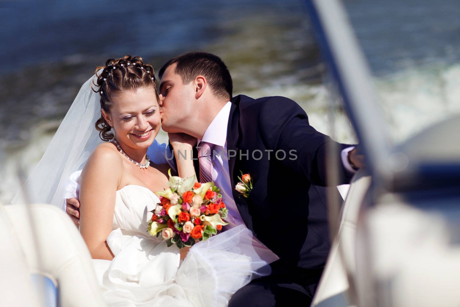 bride and groom on the boat by vsurkov