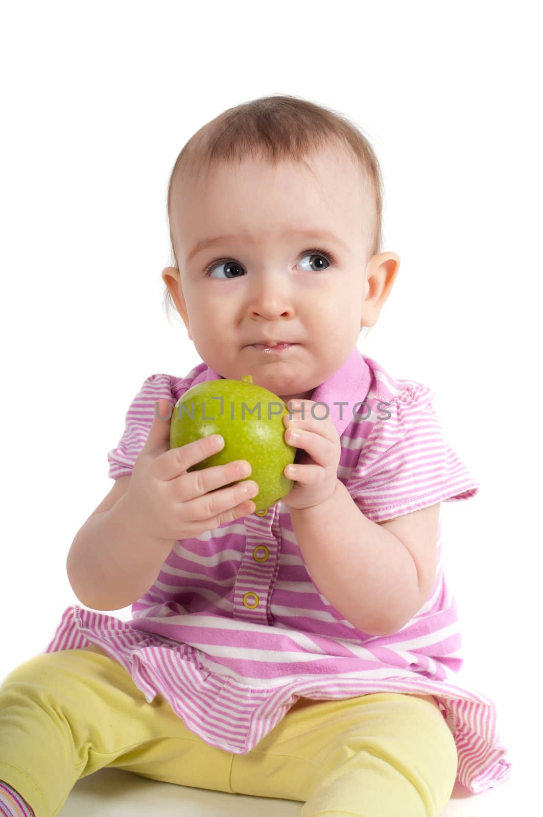 Baby girl in pink eating apple by anytka