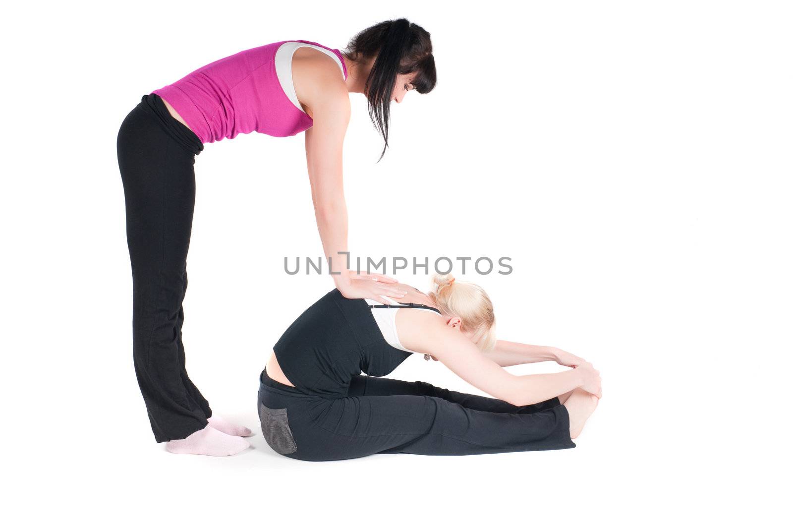 Shoot of two fitness instructors isolated on white