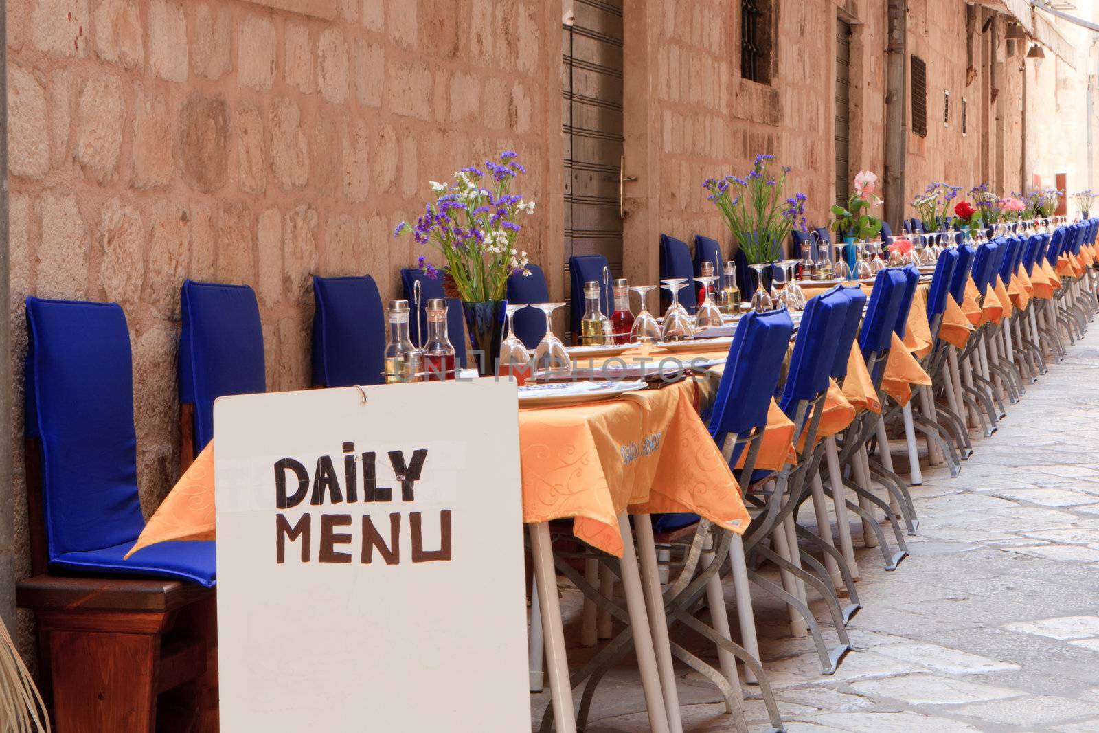 Tables in a row outside a restaurant