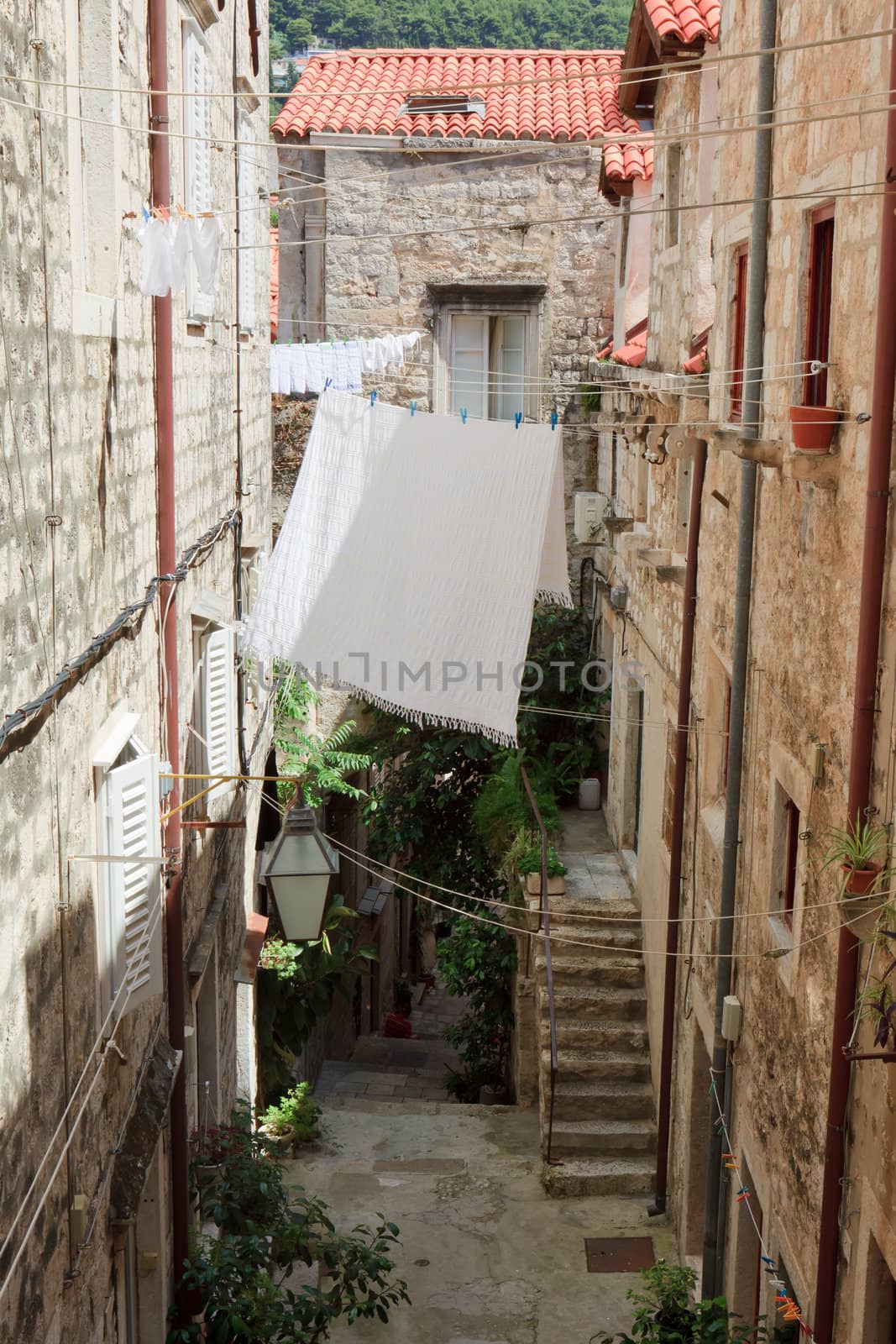 Alley with laundry hanging on a line