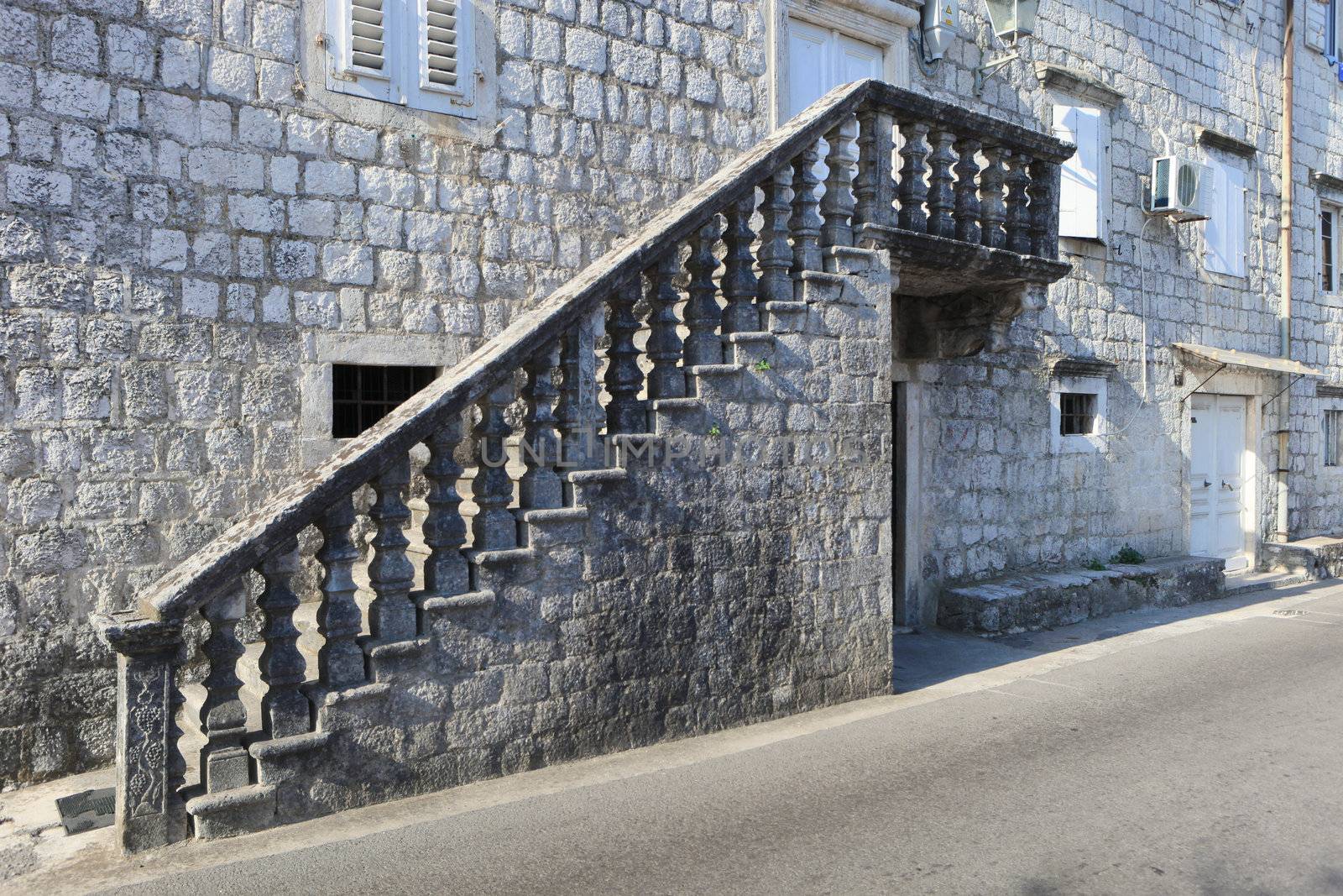 Old stone staircase outside original stone house in Montenegro