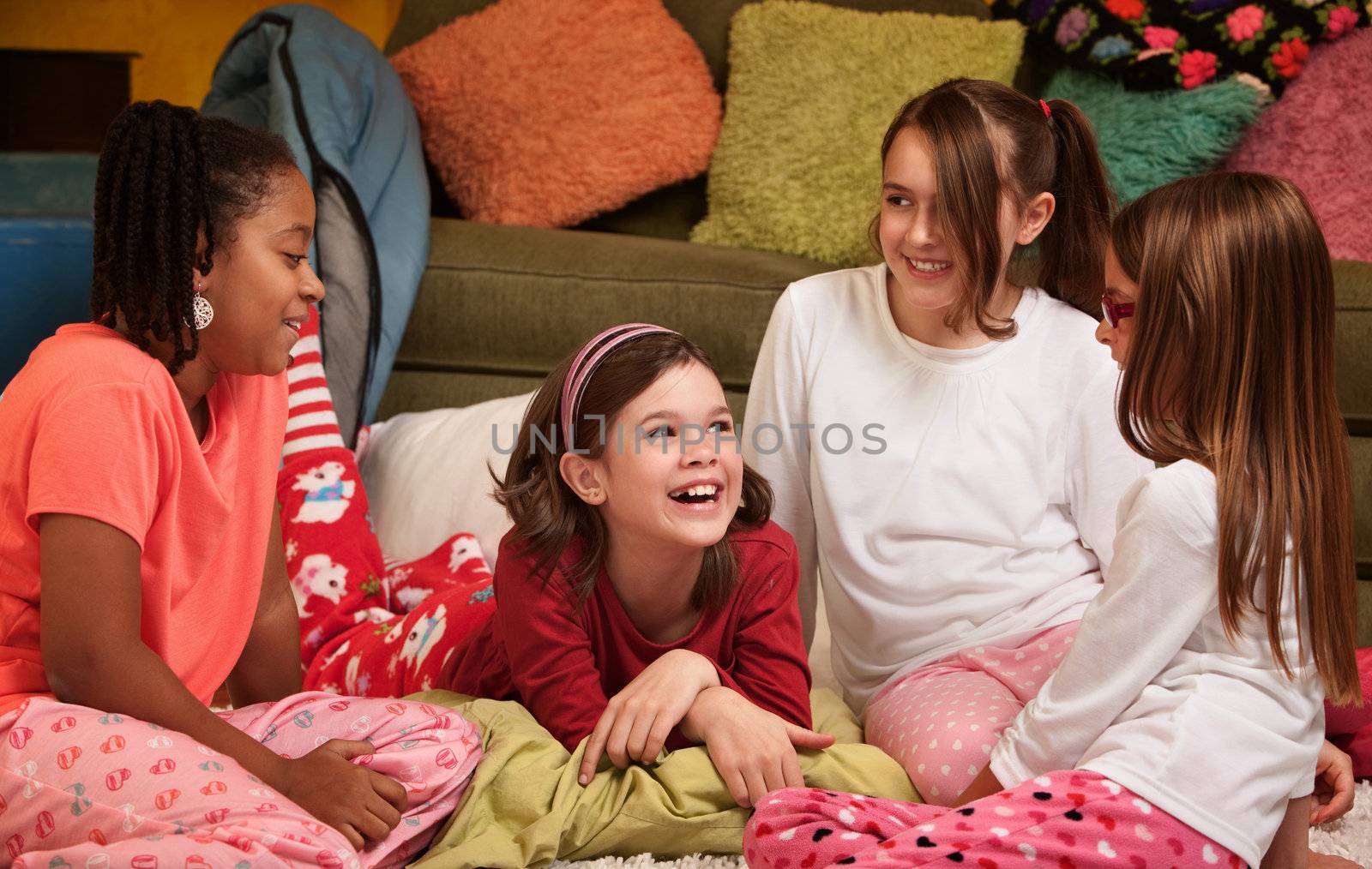 Group of happy young girls at a sleepover