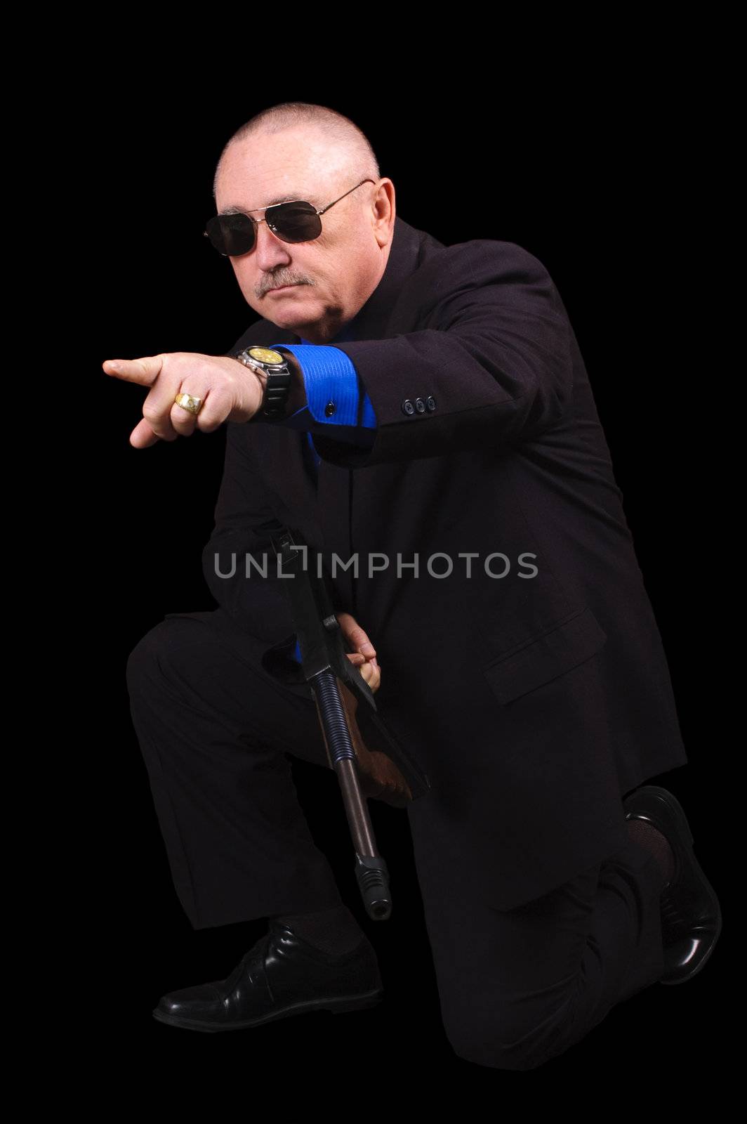 Gangster or Government agent, FBI agent, over a black background