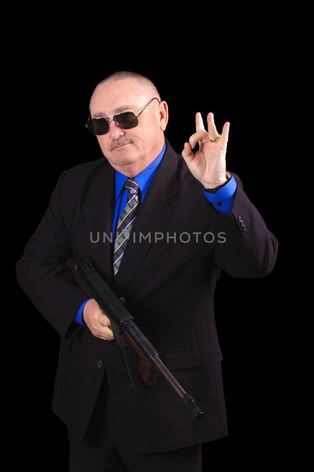 Gangster or Government agent, FBI agent, over a black background