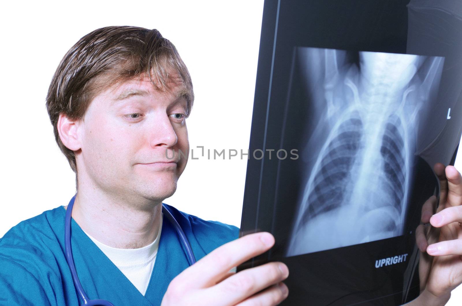 Doctor looking at xray with comical expression
