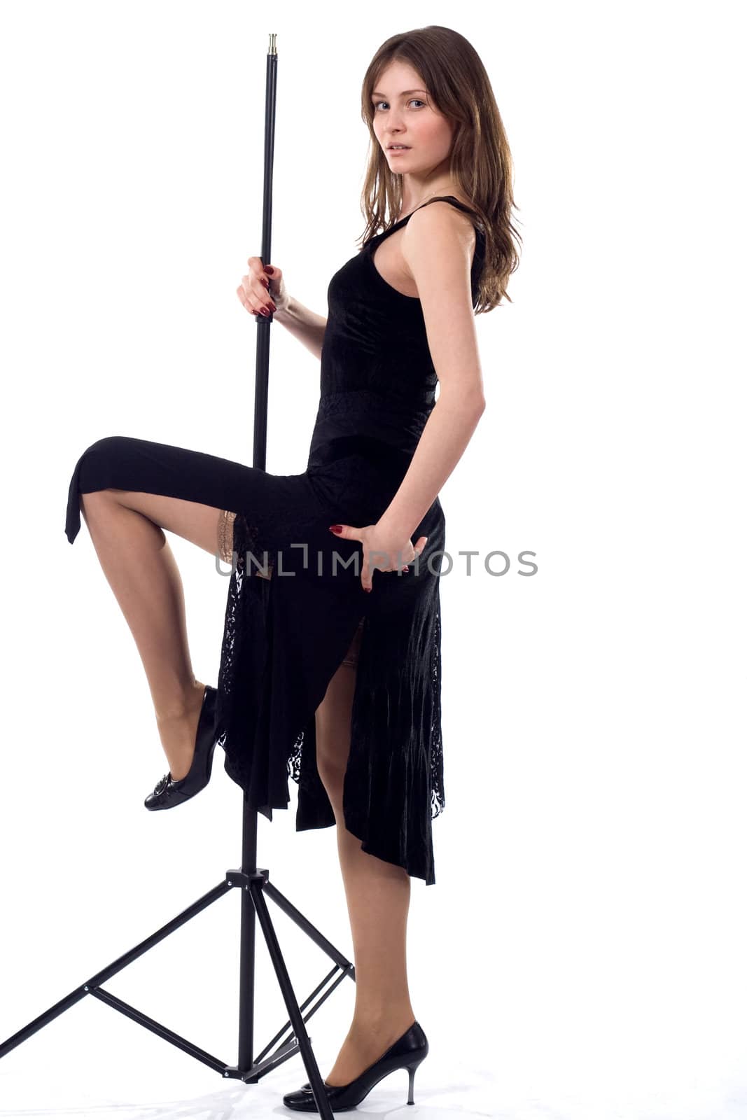 beautiful dancing girl in black with tripod
