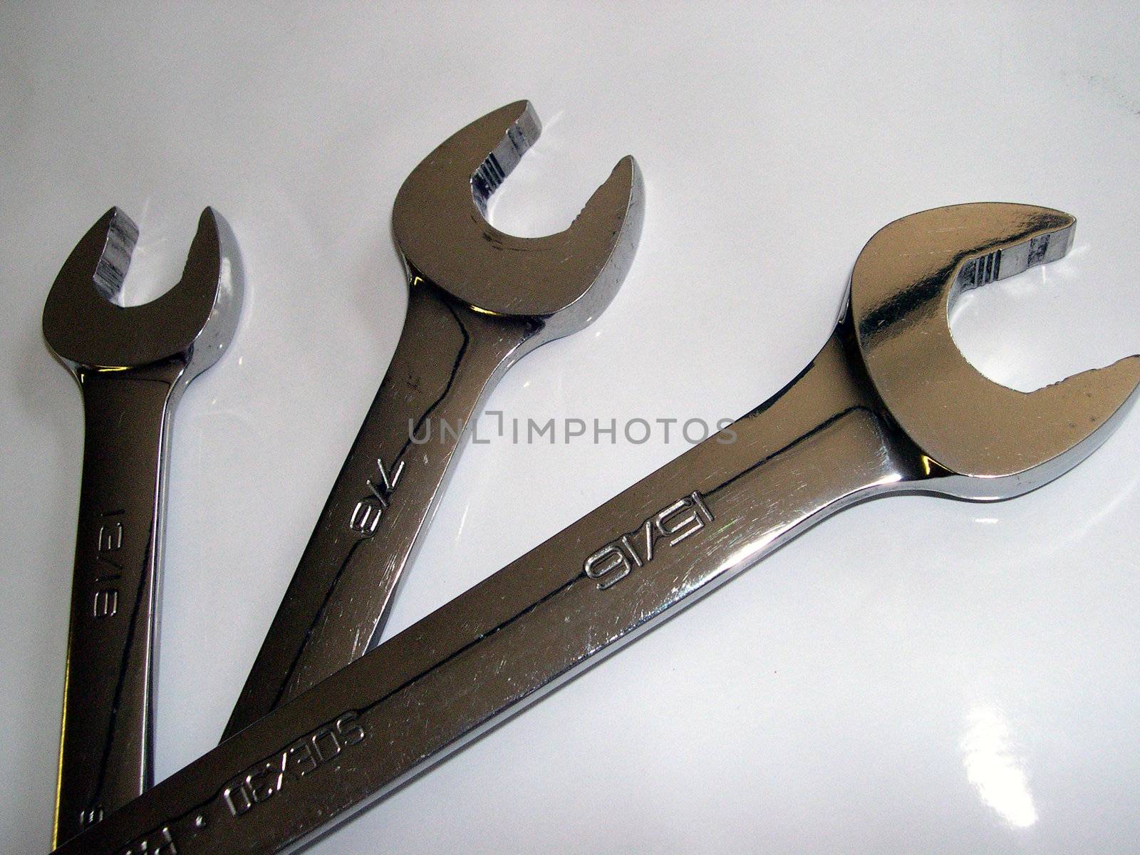 A set of three open ended wrenches. Hand tools.
