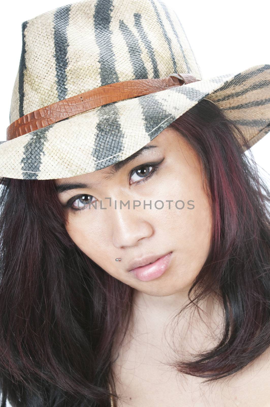 young asian girl wearing a safari hat