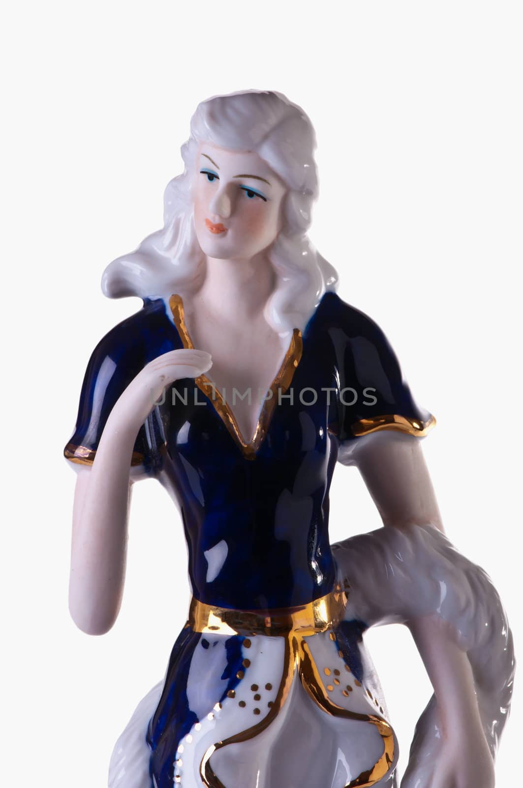 Porcelain figure of the woman in a beautiful dress