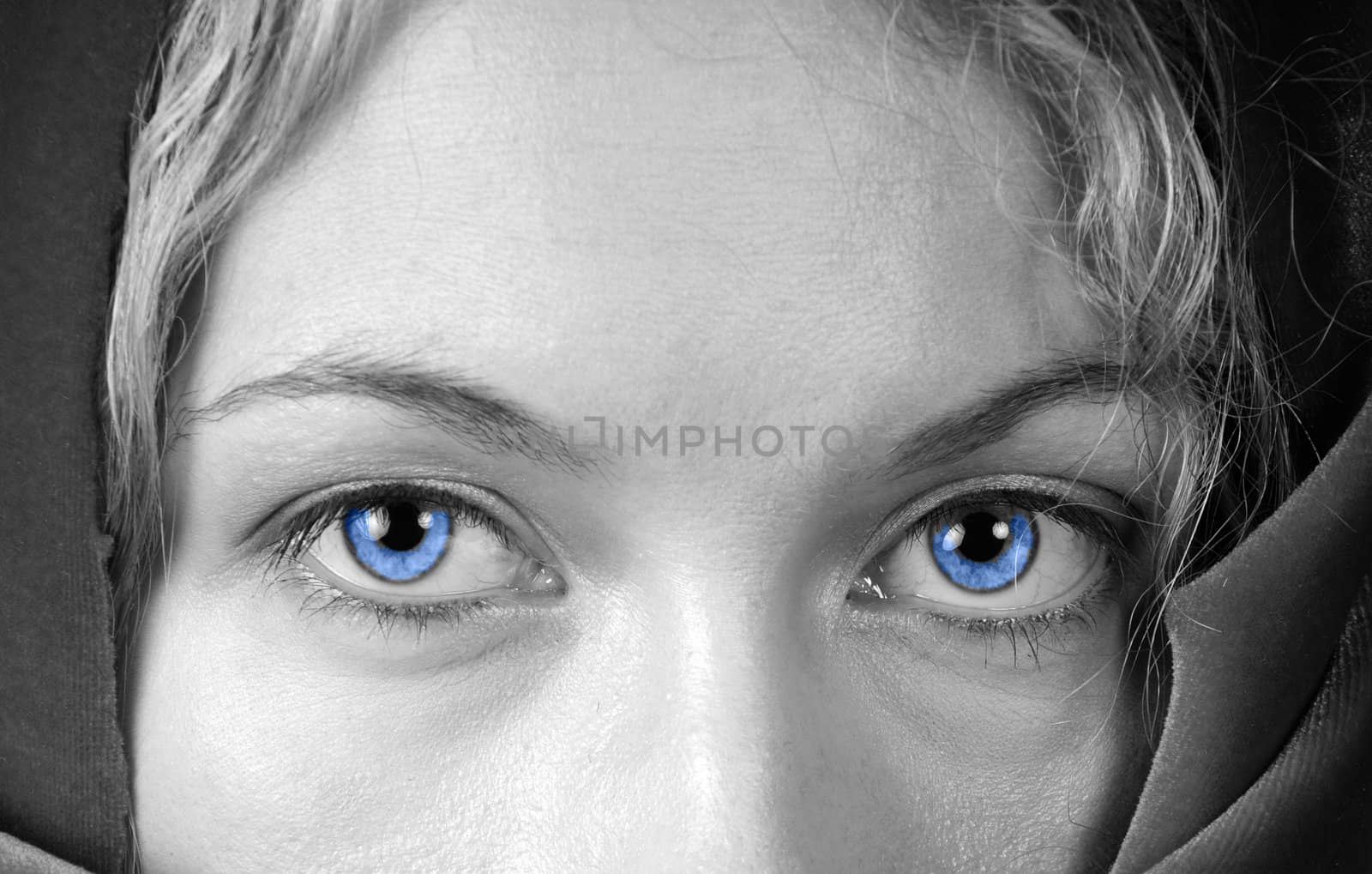 Monochrome of a beautiful woman with stunning blue eyes