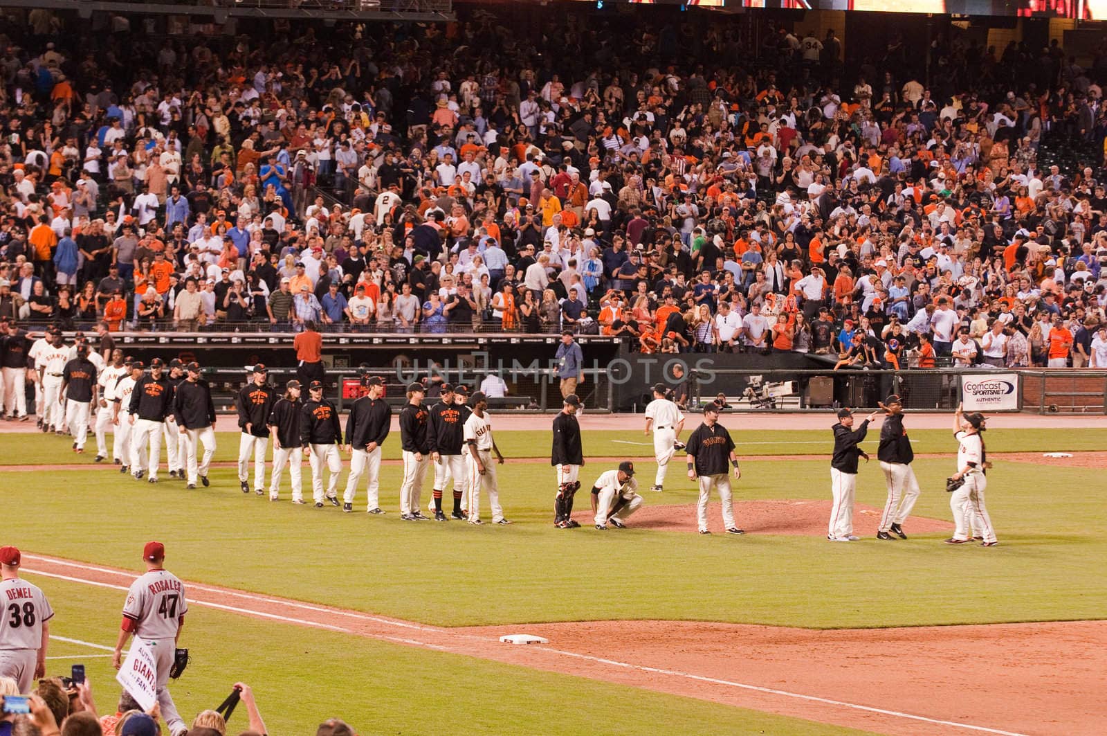 SAN FRANCISCO, CA - SEPTEMBER 28: San frnacisco Giants celebrating after winning a game against the Arizona Diamondbacks putting them in the lead for the Western Division, September 28, 2010