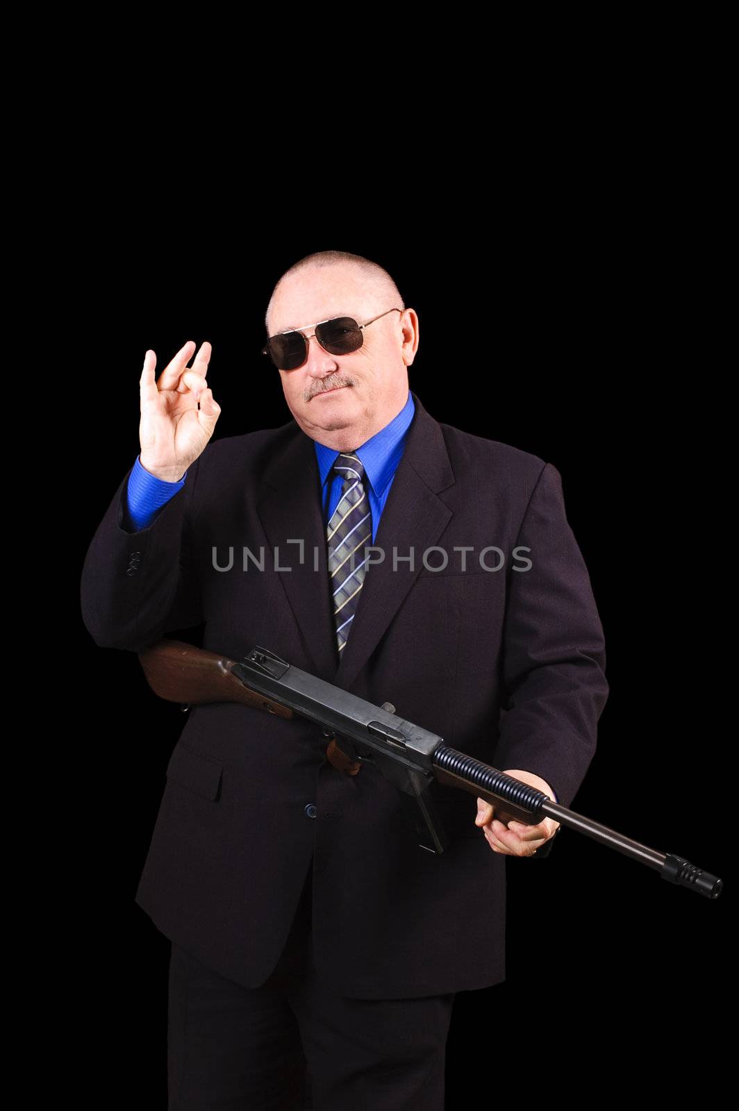Gangster or Government agent, FBI agent, over a black background