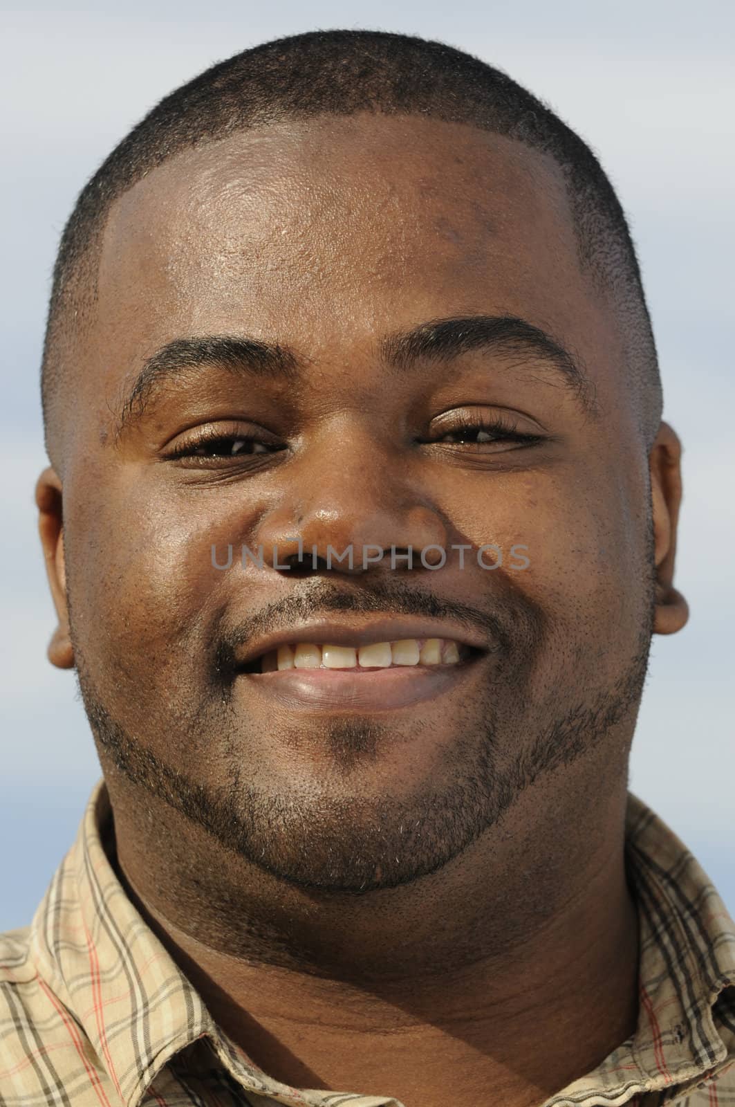 Smiling young African American Man