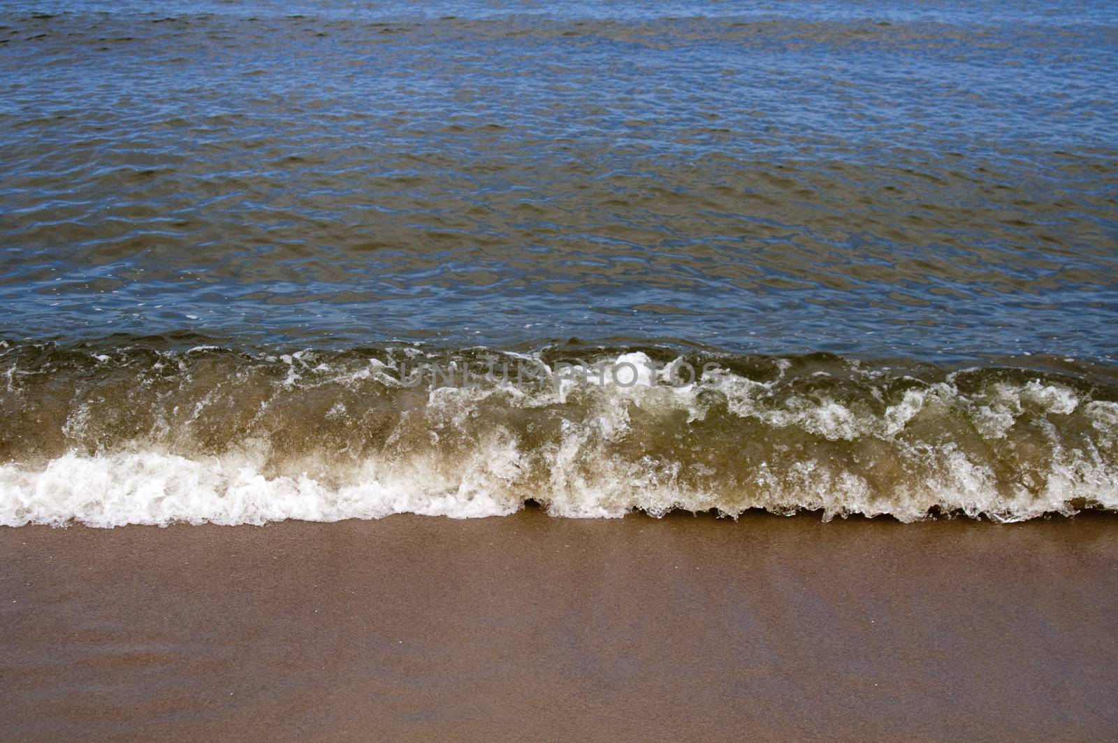 High resolution image. Running wave. Coast of Baltic sea.