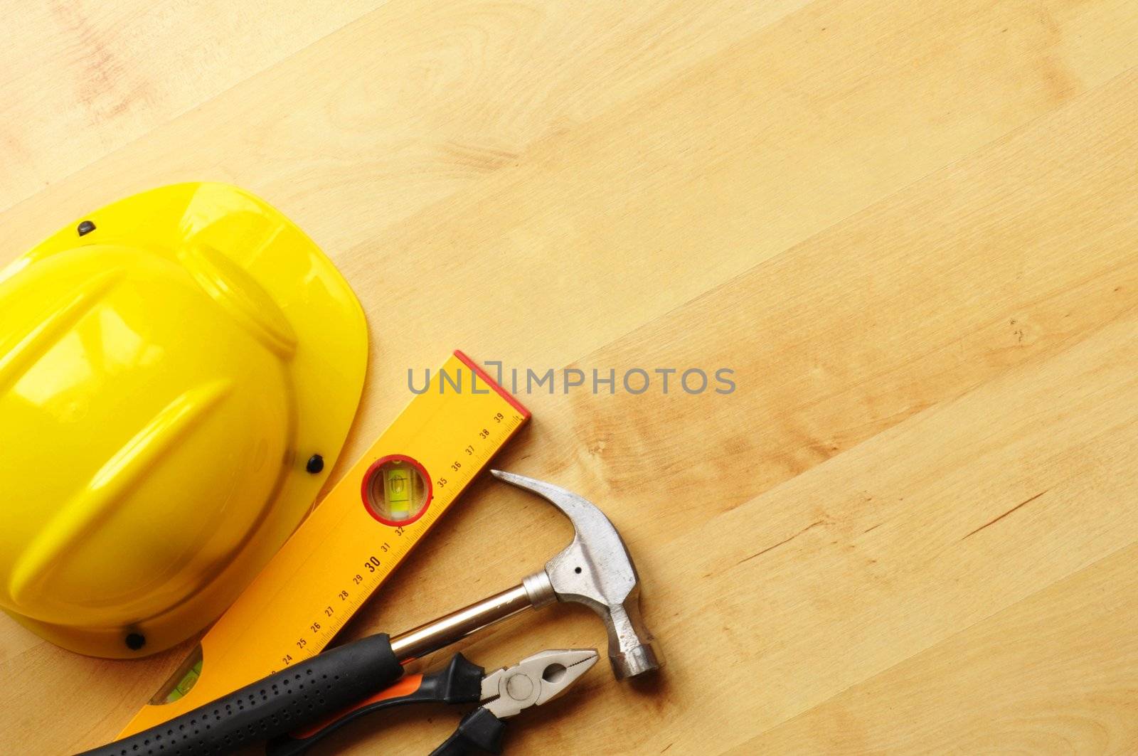 construction concept with hard hat working tools and copyspace