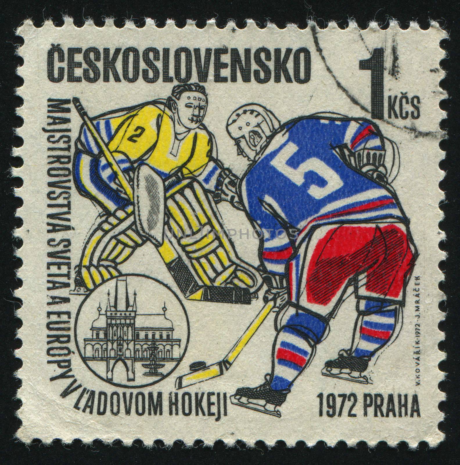 CZECHOSLOVAKIA - CIRCA 1972: Senior man playing hockey in his team uniform, circa 1972.