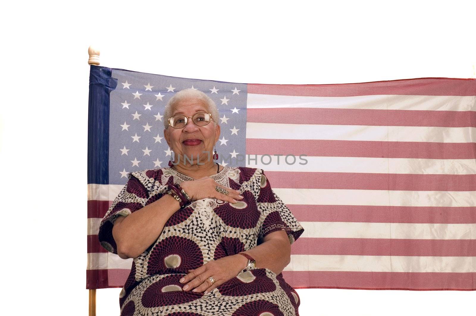 African American patriot with flag isolated over white