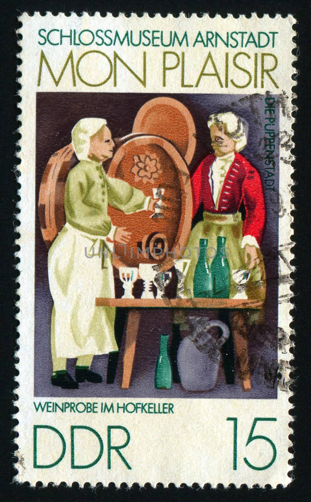 GERMANY  - CIRCA 1974: FScenes from 18th century Thurigia, Dolls Village, Arnstadt Castle Museum. Wine tasters,  circa 1974.
