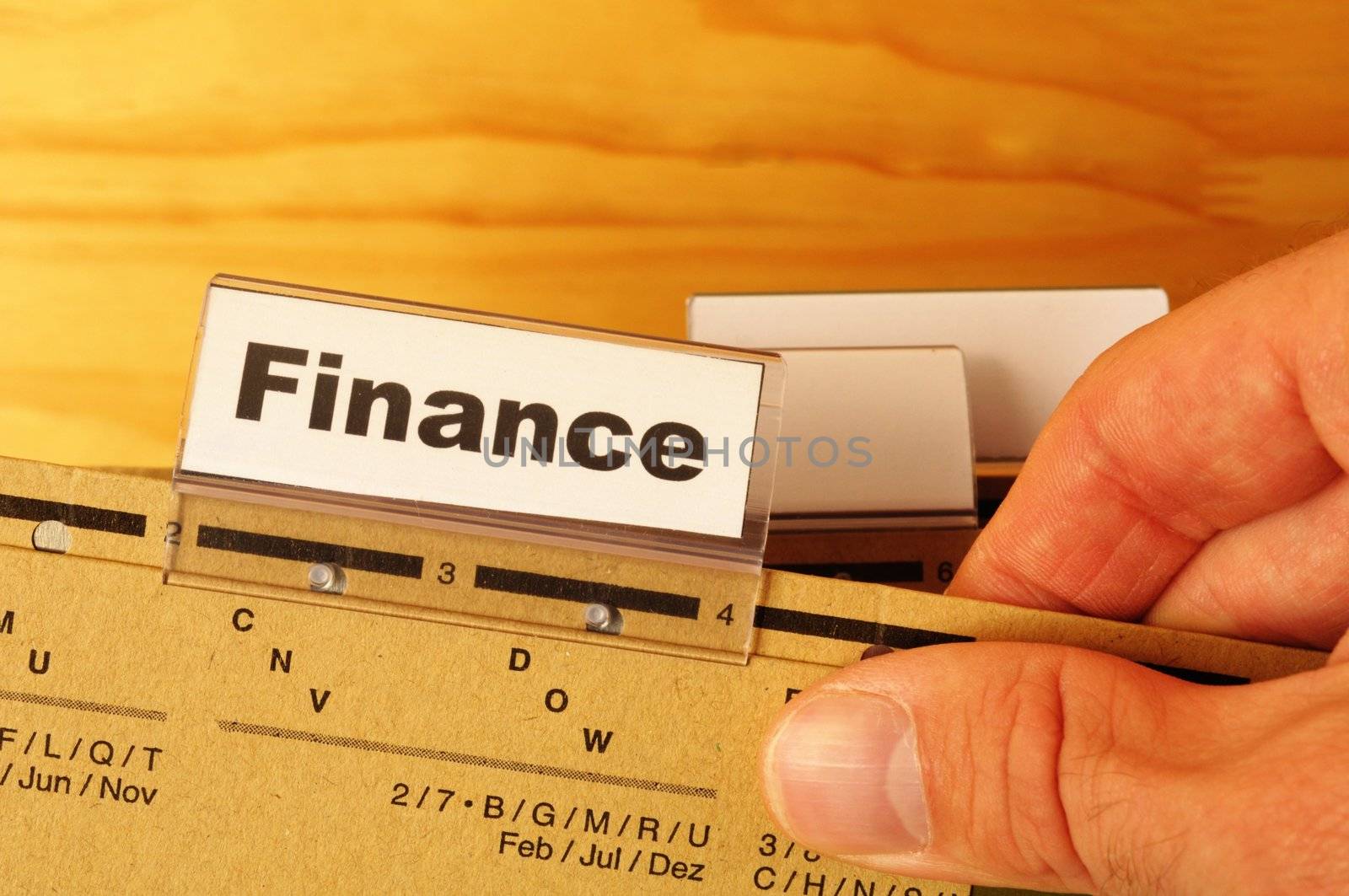 finance on business office folder showing financial success concept