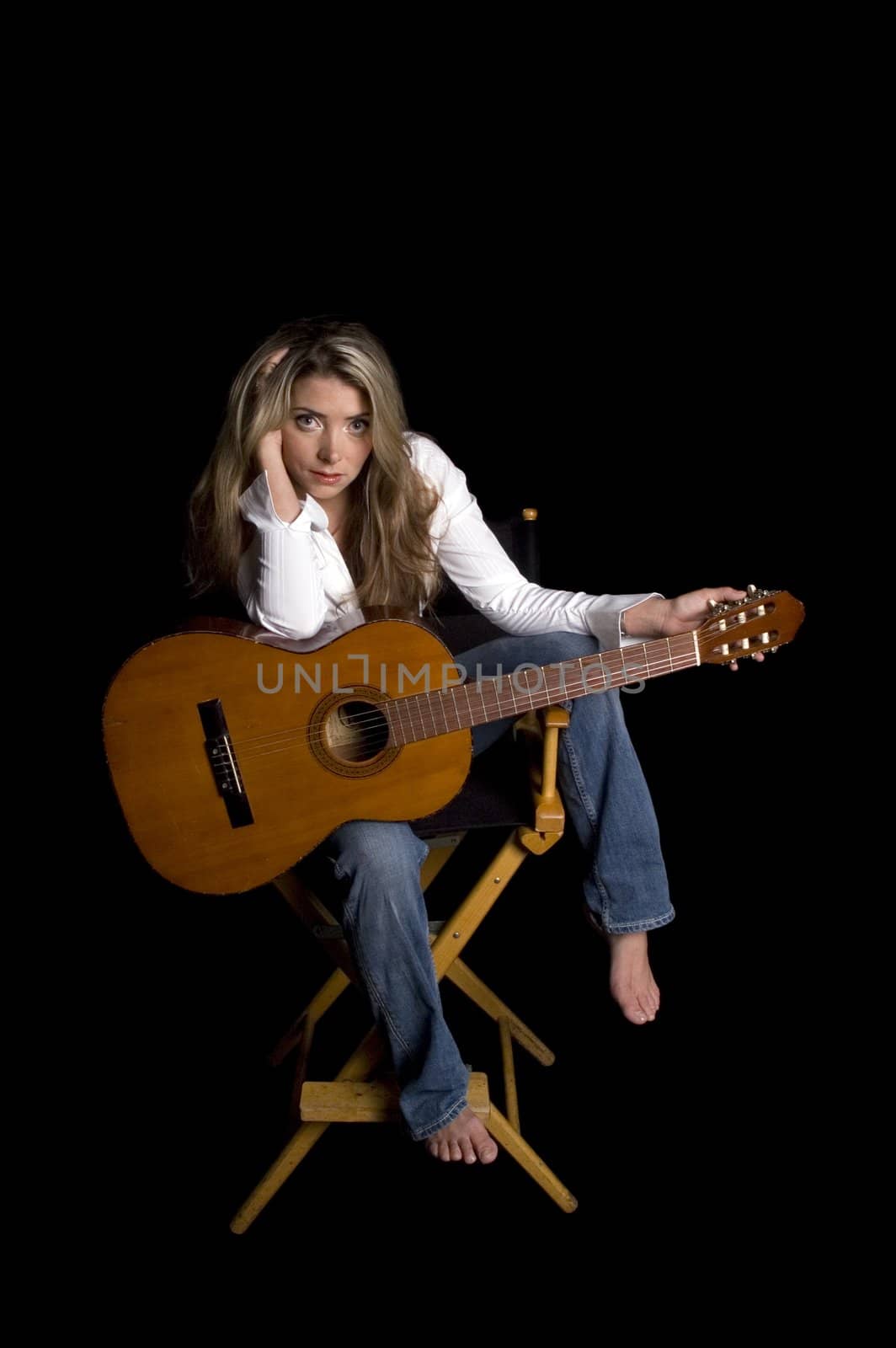 female musician resting, isolated on black 