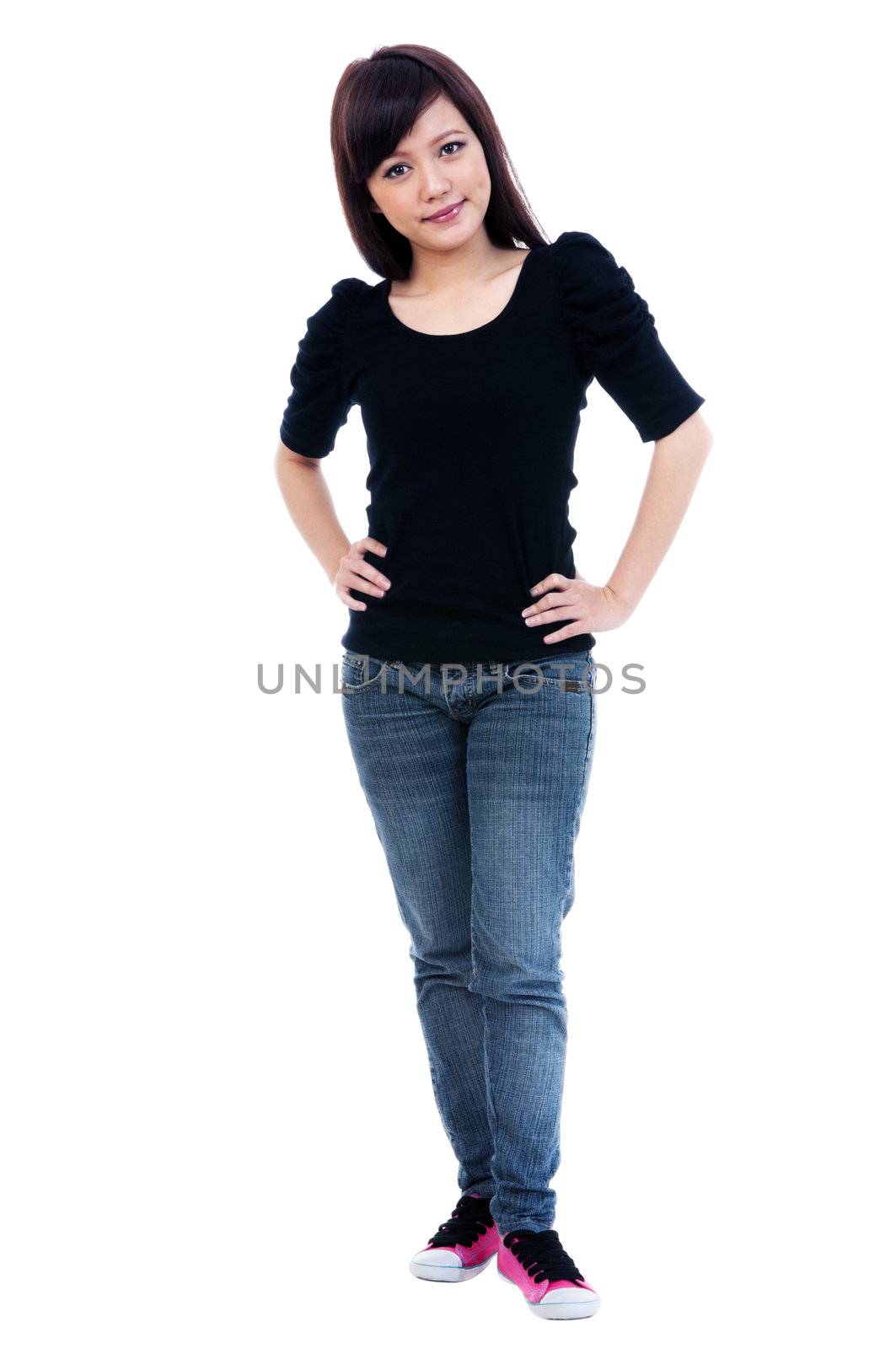 Full length portrait of a pretty young woman posing over white background.