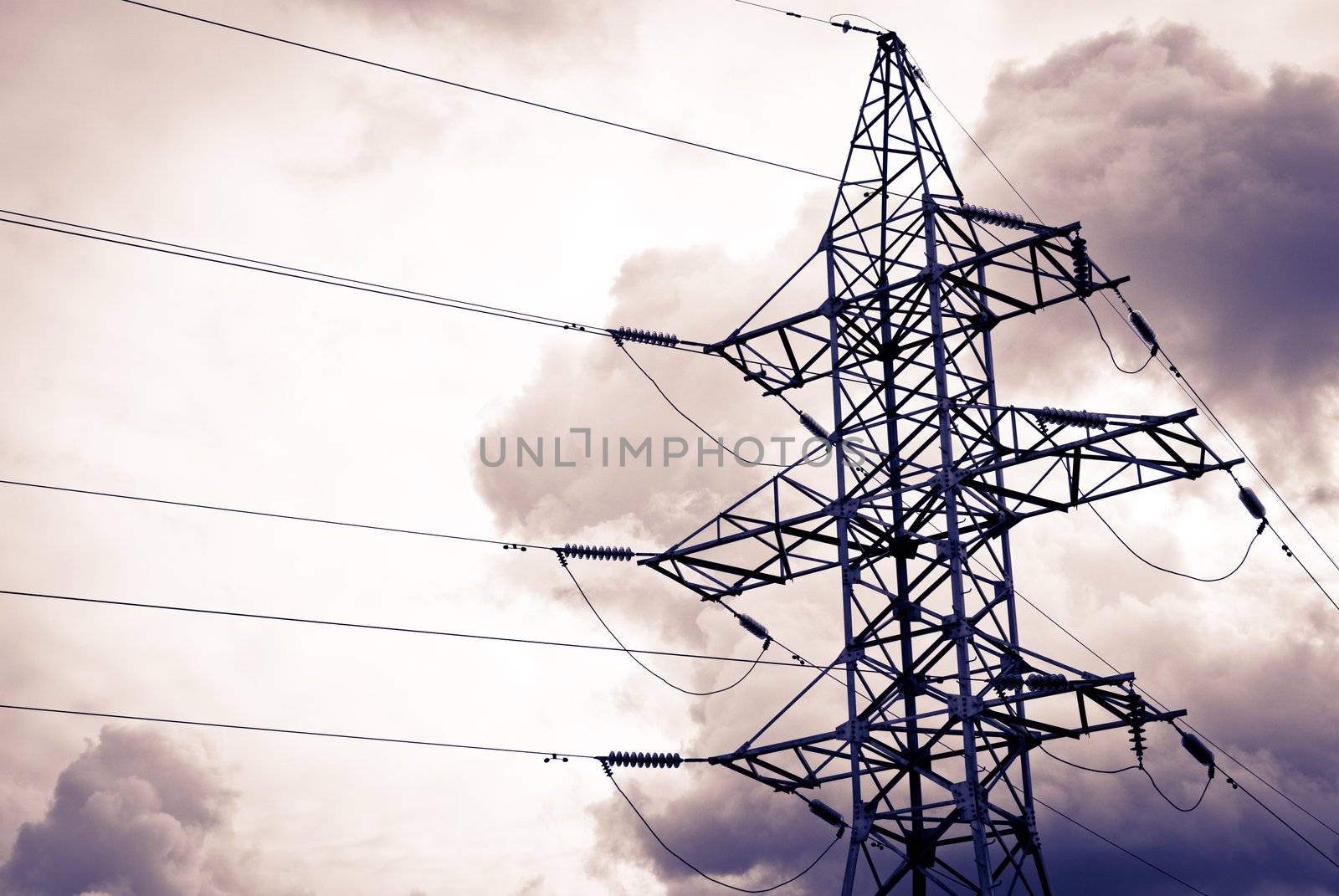 High power electrical pole on a cloudy day with silhouette
 by sasilsolutions