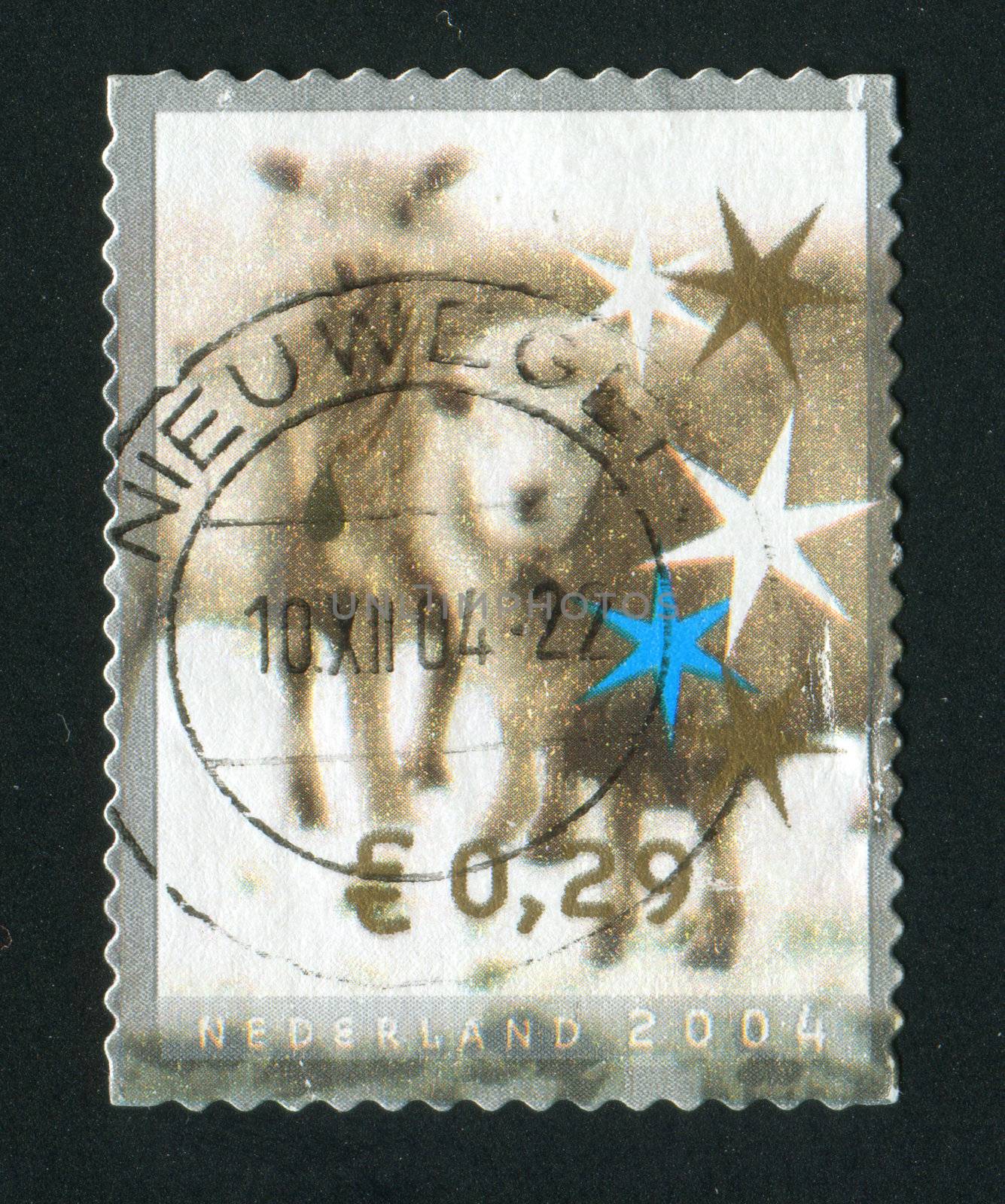 NETHERLANDS - CIRCA 2004: Christmas stamp. Reindeer against stars, circa 2004.