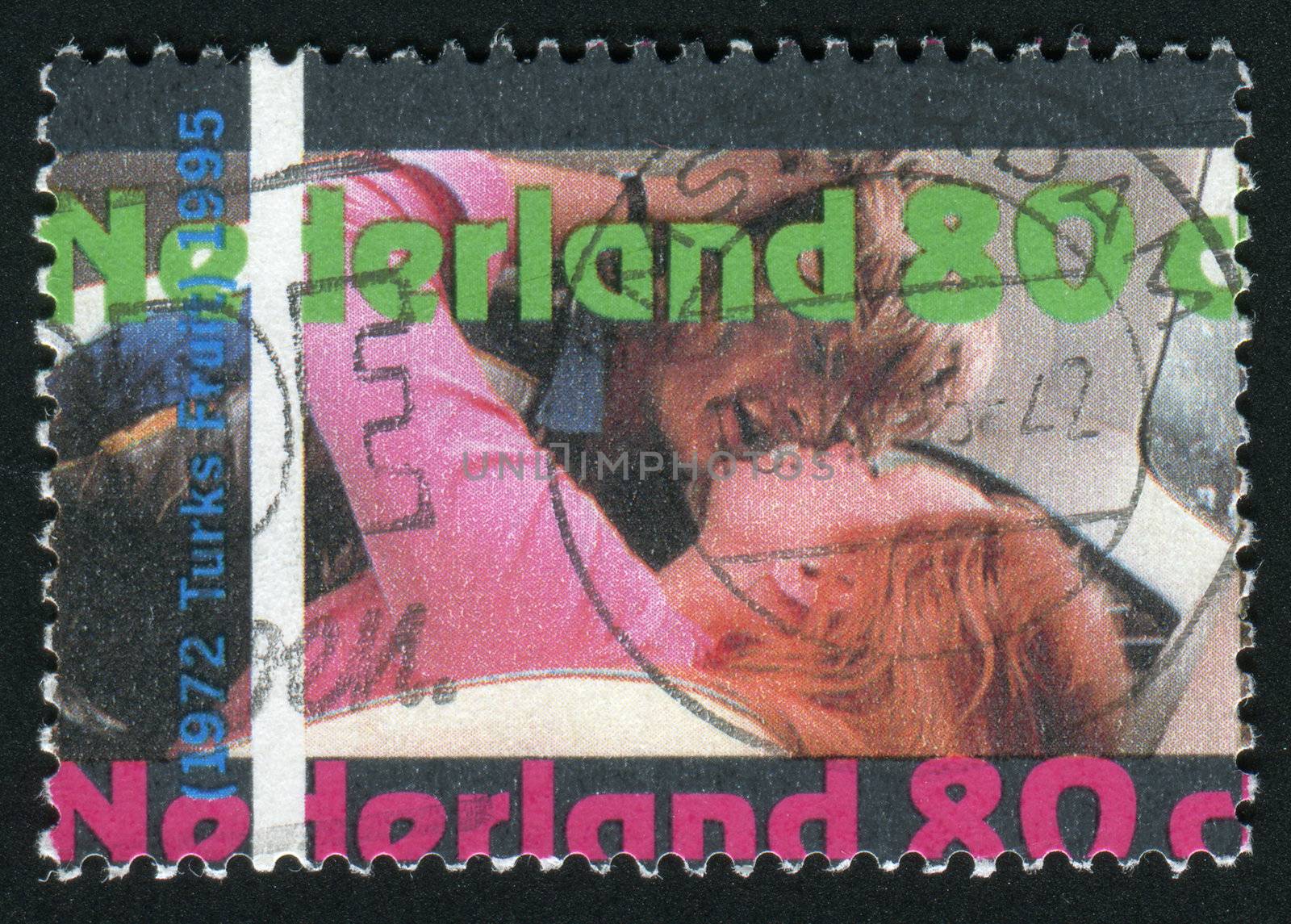 NETHERLANDS - CIRCA 1995: woman and man kissing, circa 1995.