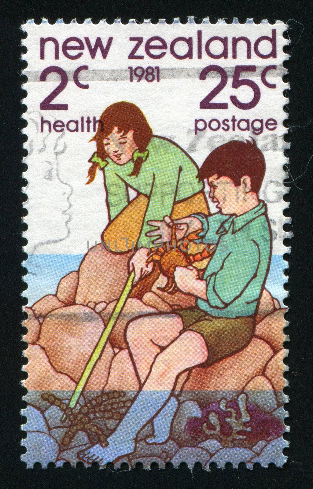 NEW ZEALAND - CIRCA 1981: Boy and girl at Rock Pool, circa 1981.