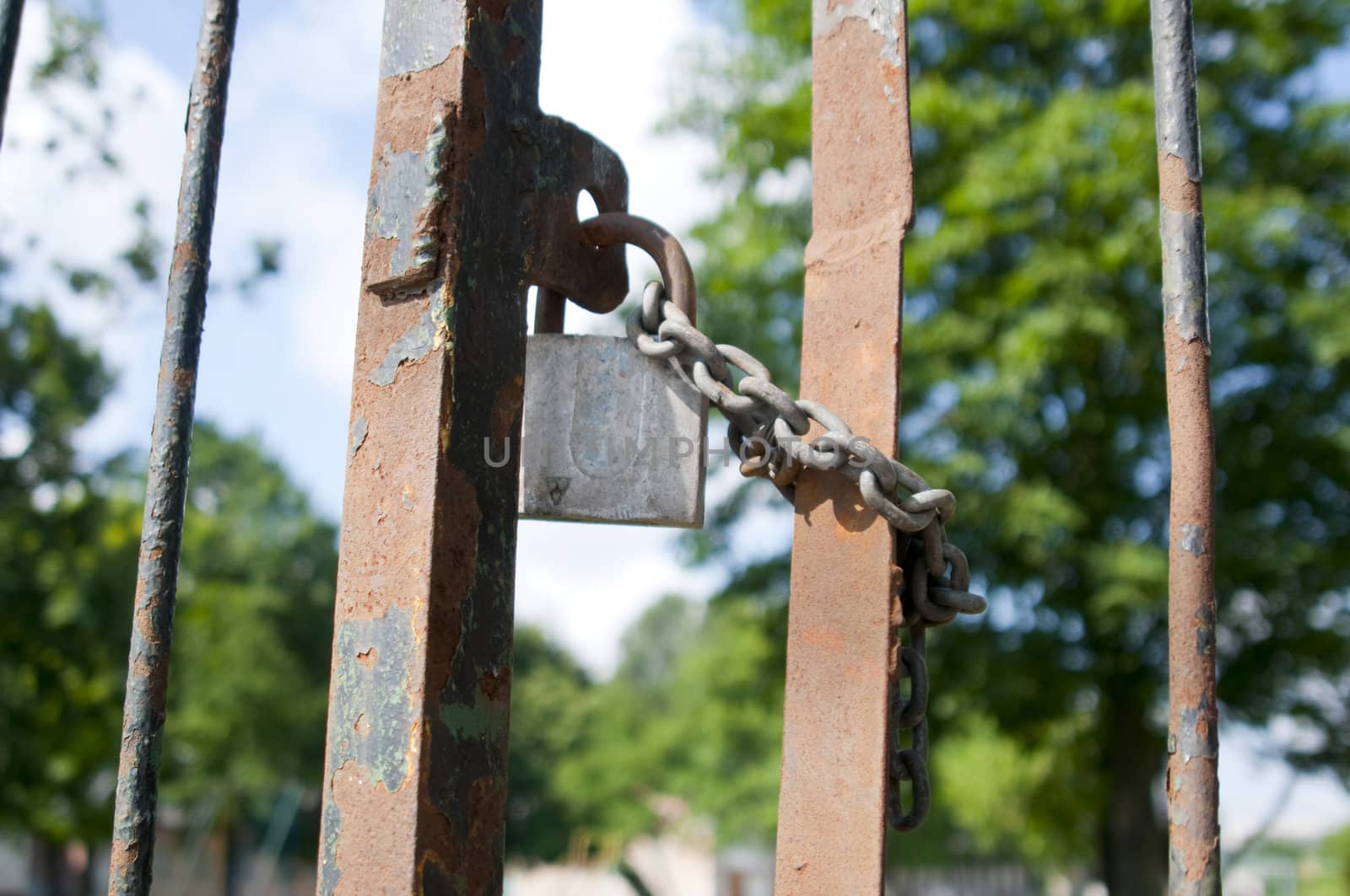 High resolution image. The old lock hanging on doors.