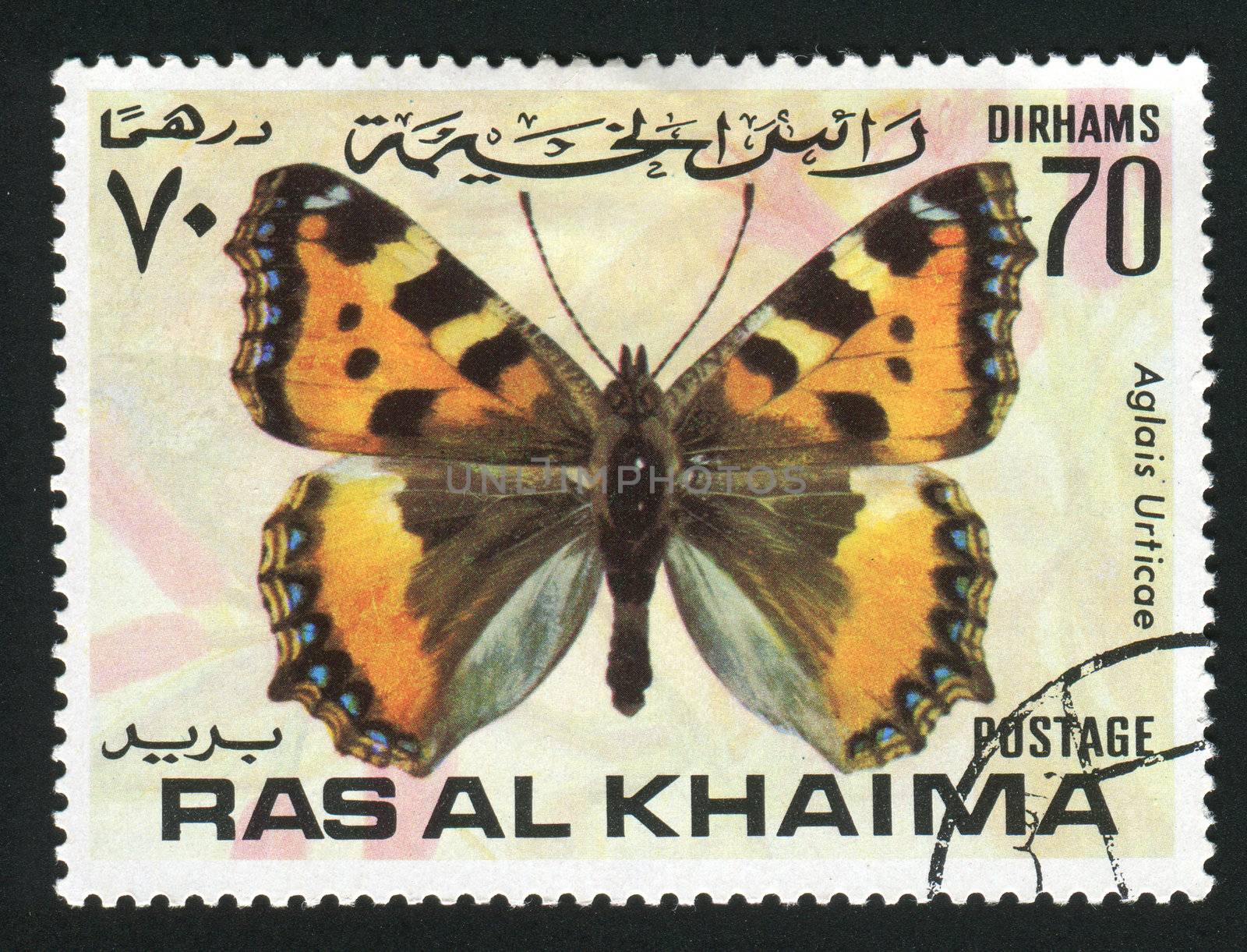 RAS AL KHAIMA - CIRCA 1978: Aglais urticae is a well-known colourful butterfly, found in temperate Europe, circa 1978.