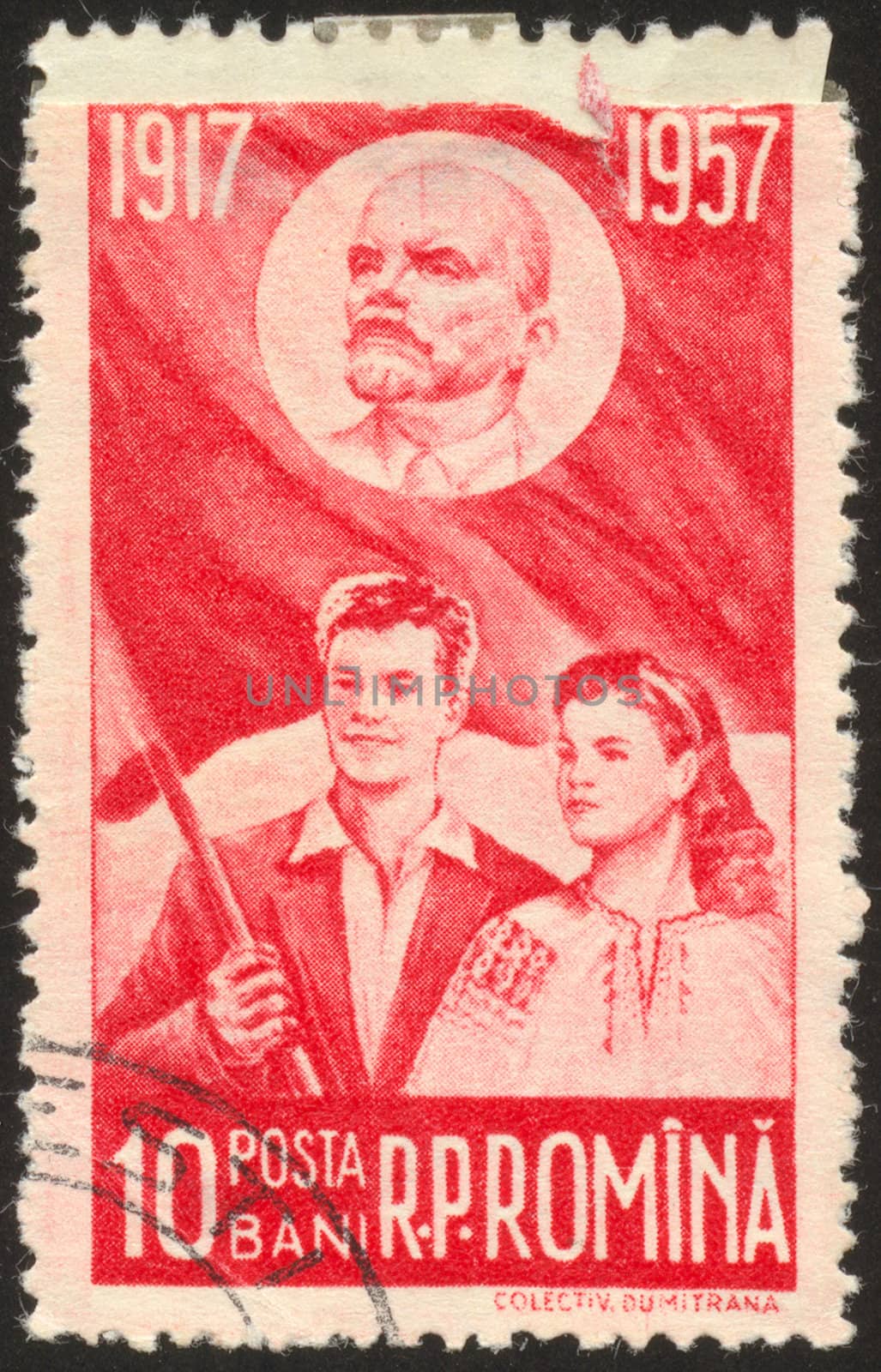 The scanned stamp. Stamp of Romania. The guy and the girl against a flag.